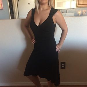 Slinky black dress. Ruching in side